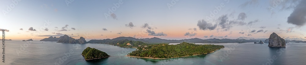 Drone panorama of the paradisiacal Maremegmeg beach near El Nido on the Philippine island of Palawan