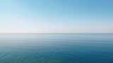 Tranquil minimalist landscape with a smooth blue sea surface with calm waters with a horizon and clear skies. Simple beautiful natural calm background. Generative AI.