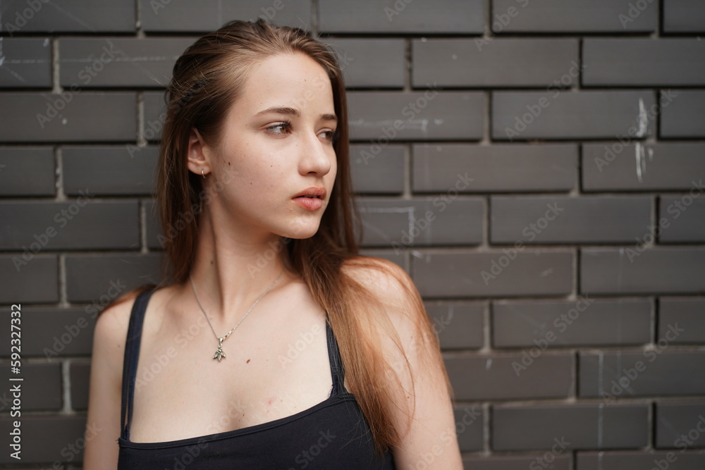 Stylish female teenager, Portrait of millennial young woman outdoors Stylish female teenager, Portrait of millennial young woman outdoors