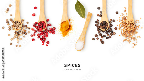 Different spices in bamboo spoon isolated on white background.