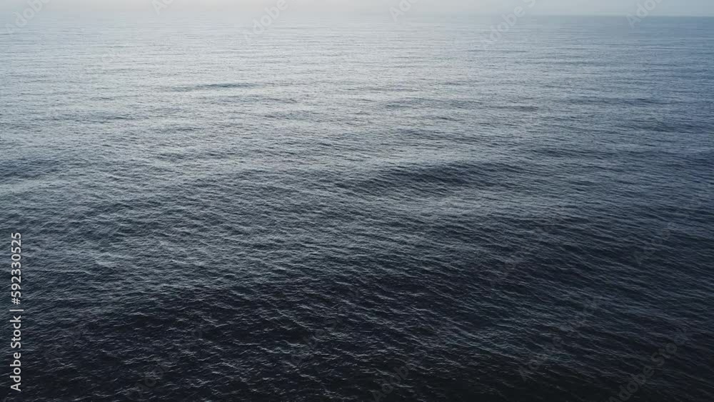 Beautiful sea summer landscape Waves sea water surface High quality video Bird's eye view,Wide angle lens, Drone view ocean sea background Beautiful sea summer landscape Waves sea water surface High quality video Bird's eye view,Wide angle lens, Drone view ocean sea background
