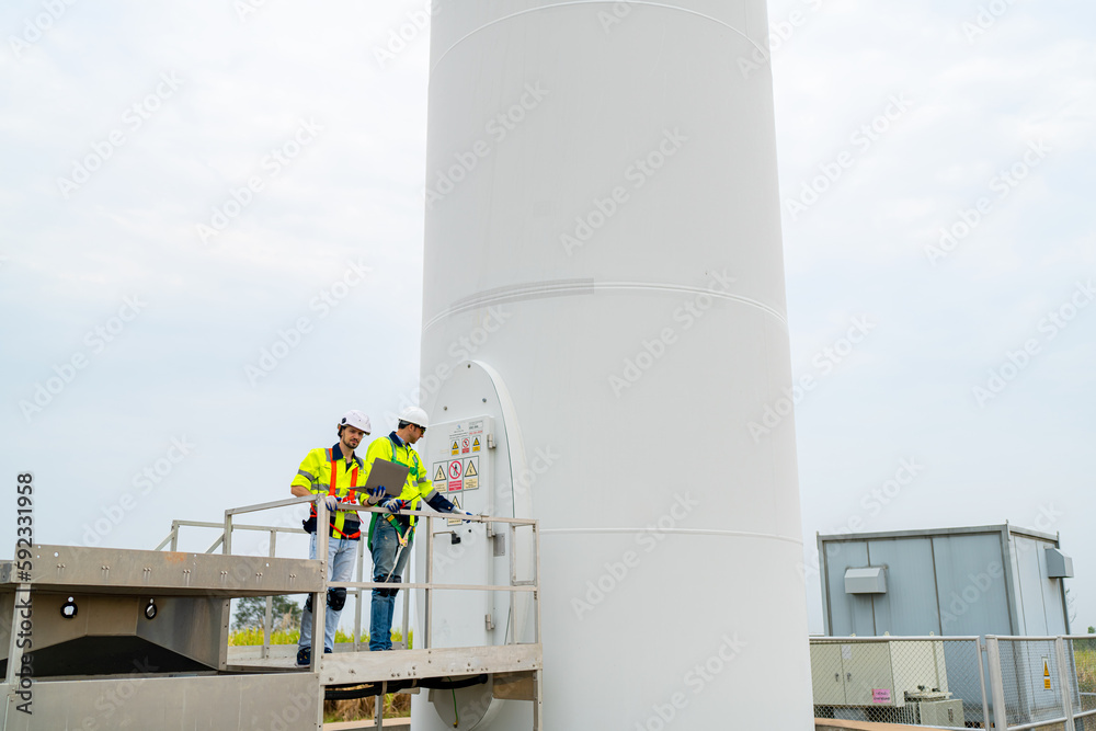 Wind turbine service engineer maintenance and plan for inspection at construction site, renewable electricity generator. Wind turbine service engineer maintenance and plan for inspection at construction site, renewable electricity generator.