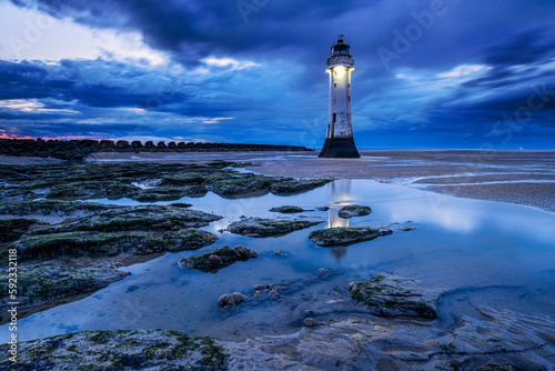 Perch Rock Lighthouse and the sands of New Brighton at twilight, New Brighton, The Wirral, Merseyside photo