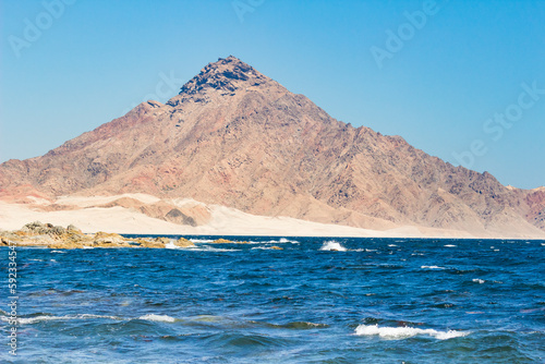 Mountain on coastline near Hasik, Dhofar Governorate, Oman, Middle East photo