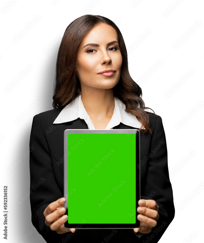 Portrait of young brunette businesswoman showing tablet pc, touchpad, with copy space for text, isolated on white background. Confident beautiful business woman at studio Portrait of young brunette businesswoman showing tablet pc, touchpad, with copy space for text, isolated on white background. Confident beautiful business woman at studio