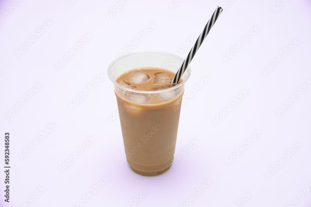 Shot of an iced coffee in a plastic takeaway cup