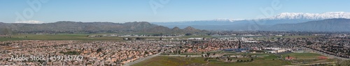 Panorama of the city of Hemet with snow covered mountains in the distance photo
