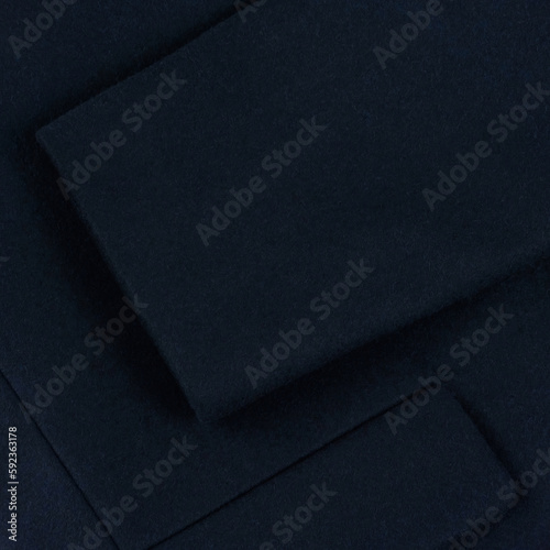 Dark blue wool coat details: sleeve and pocket
