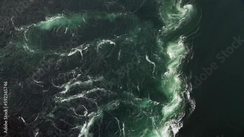 Top view of strong tidal current Salstraumen in Norway with vortex
