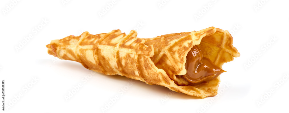 Homemade Waffle cones with condensed milk, isolated on white background.