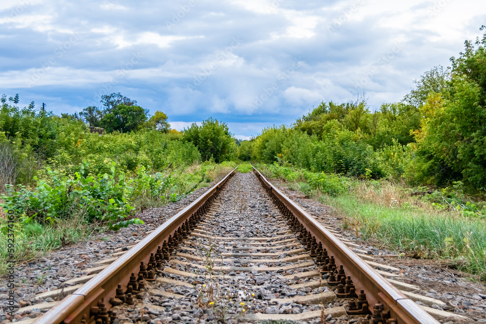 Photography to theme railway track after passing train on railroad Photography to theme railway track after passing train on railroad