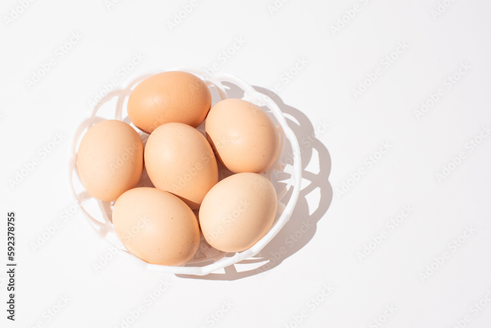 Eggs in bowl on white background, Easter eggs. Protein food Eggs in bowl on white background, Easter eggs. Protein food
