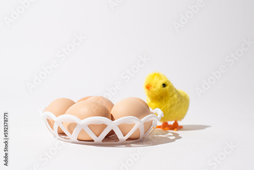 Eggs in bowl on white background, Easter eggs. Protein food © Vita