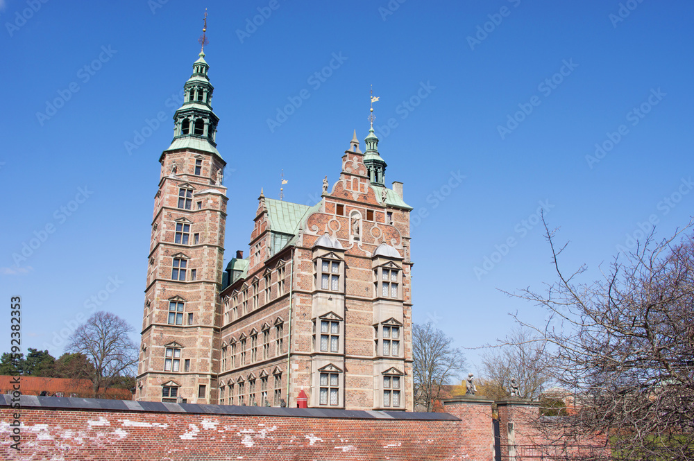 Rosenborg castle in Copenhagen in Denmark with a clear blue sky