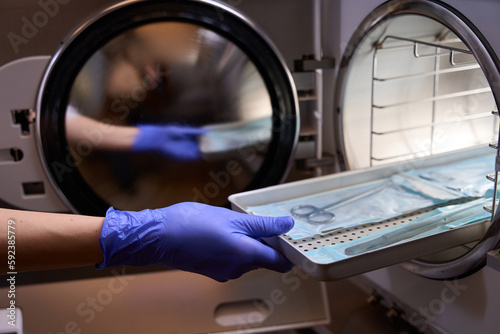 Side view the process of sterilizing medical instruments in an autoclave