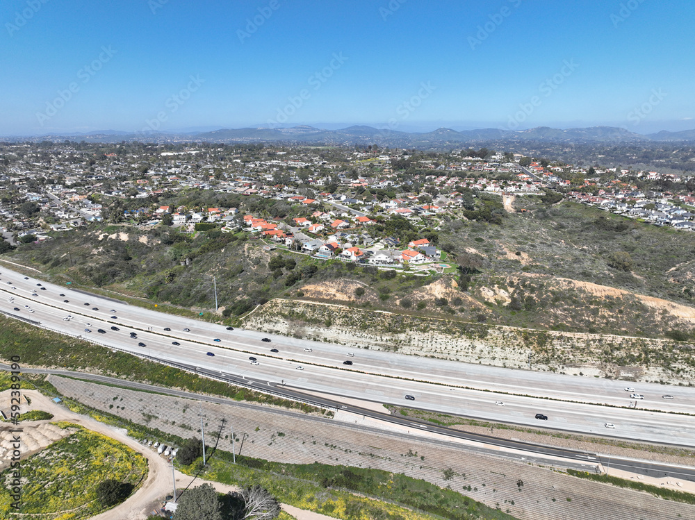 Aerial view of highway transportation with small traffic, highway interchange and junction, San Diego Freeway interstate 5, California