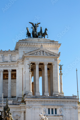 Victor Emmanuel II Monument on Venetian Square and Quadriga of Unity at the top of Propylaea, Rome, Italy.