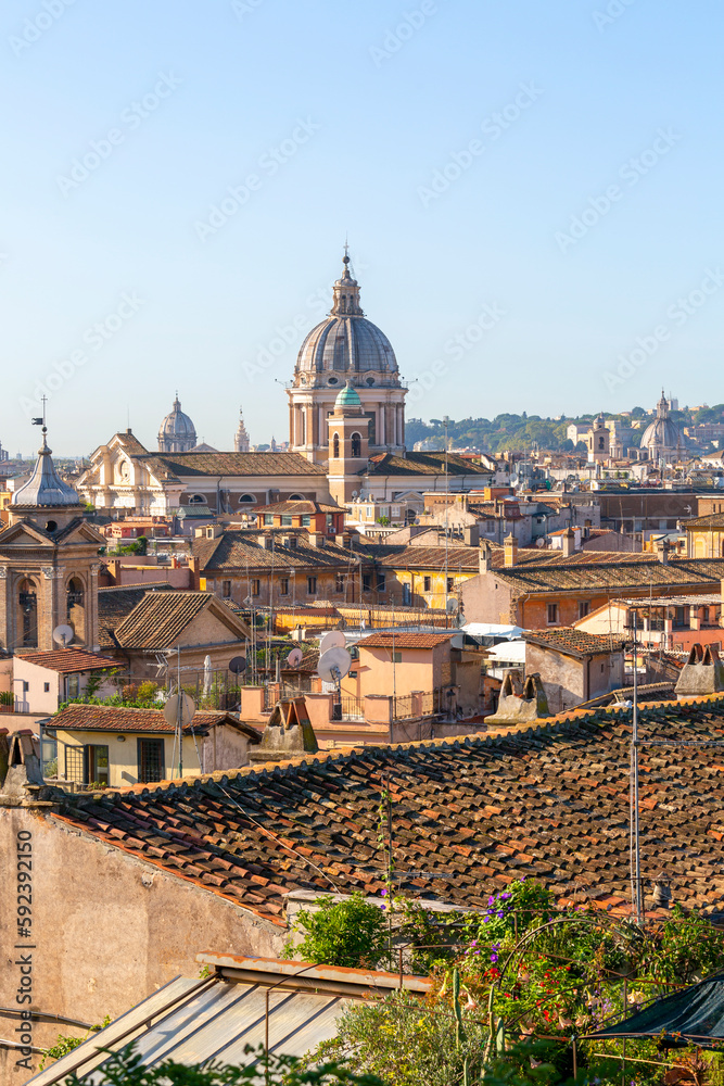 Aerial view of the city with Saint Peter's Basilica in Vatican City in the distance, Rome, Italy