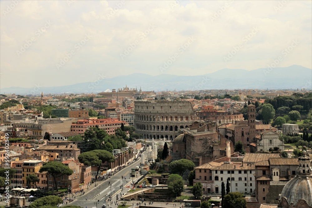 view of the ancient Forum Romanum and the Colosseum in Rome, Italy