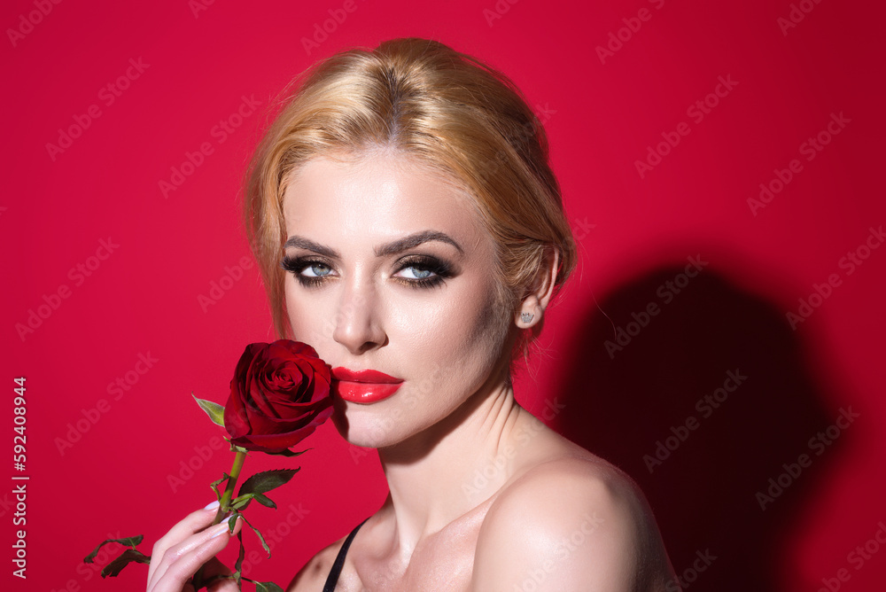 Pretty woman, with red lips, and fashion makeup with roses posing in studio. Beauty and fashion portrait. Pretty woman, with red lips, and fashion makeup with roses posing in studio. Beauty and fashion portrait.