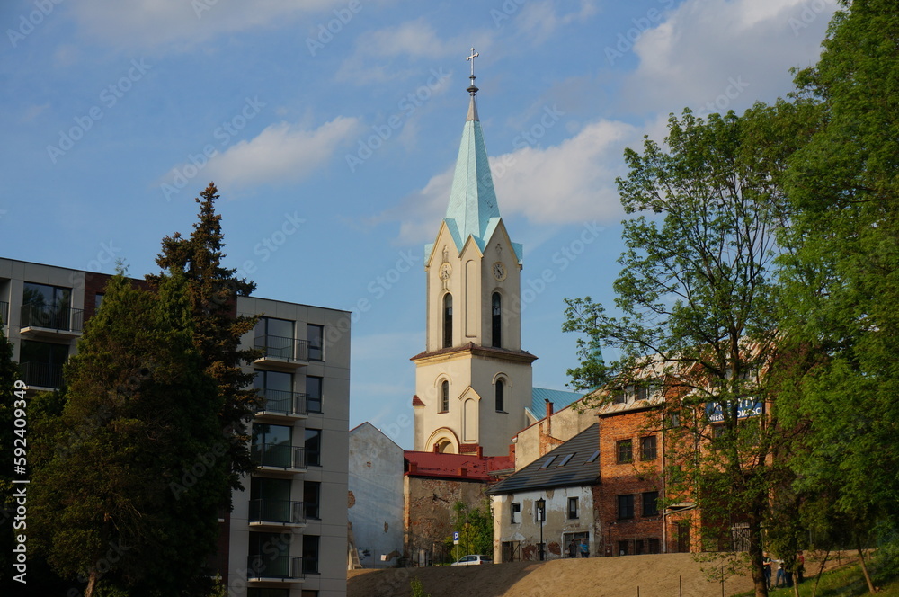 Square Tower of Church of the Assumption of the Blessed Virgin Mary (Kosciol pw. Wniebowziecia Najswietszej Marii Panny). Oswiecim, Poland.
