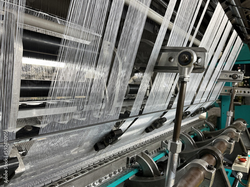 Photos Industrial knitting machine for knitting textile fabrics