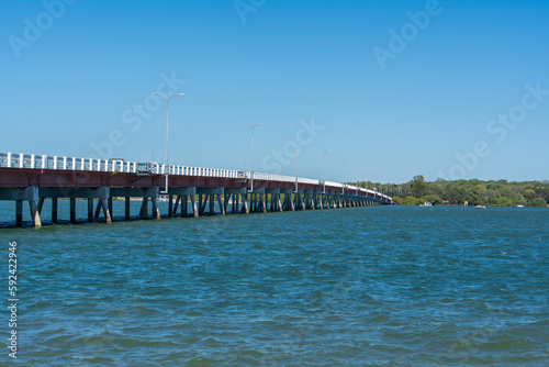 Bribie Island bridge crossing Sandstone Passage  viewed from Sylvan Beach on Bribie Island  Queensland  Australia