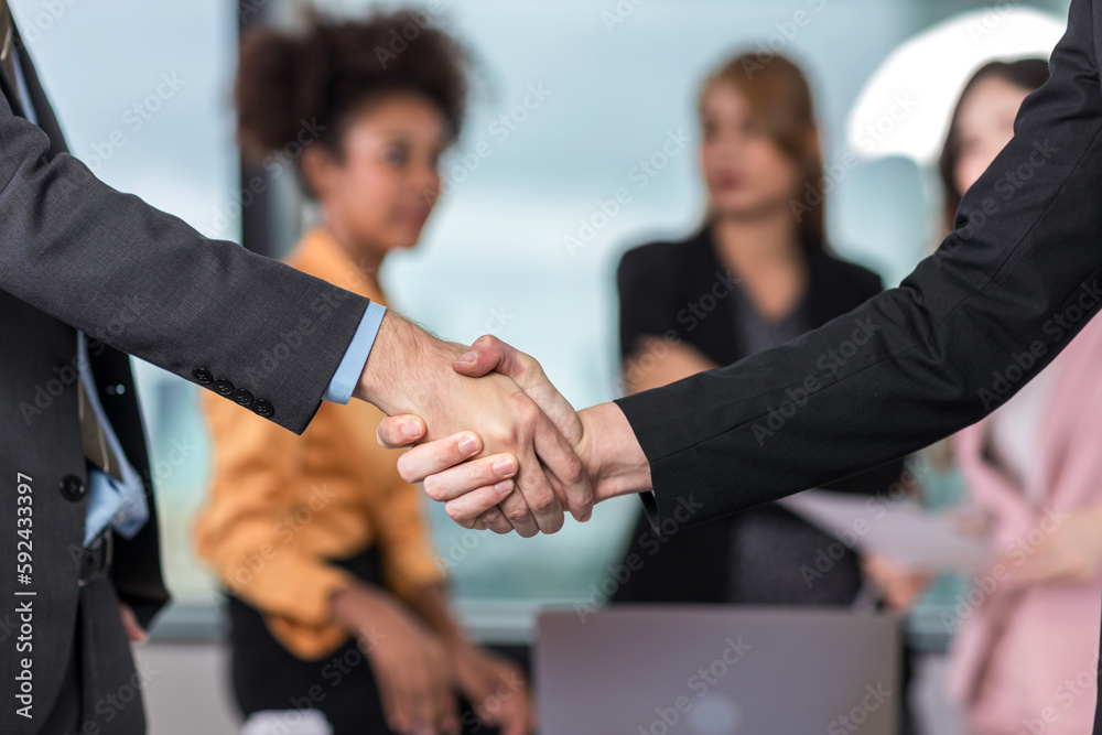 Business people shaking hands. Businessman shaking hands during a meeting in the office
