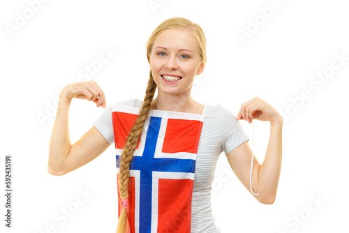 Young woman holding norwegian flag