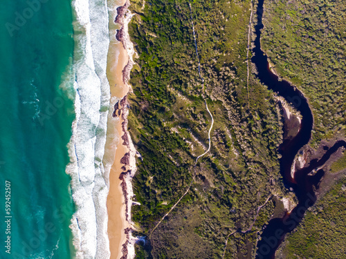 Slika na platnu Aerial (drone) view of a spectacularly beautiful long Ten Mile Beach and Pacific
