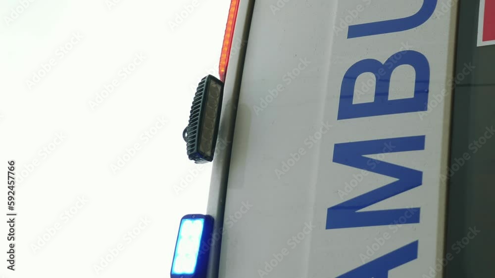 Ambulance emergency car with flashing blue lights. Vertical video. Signal lights Ambulance emergency car with flashing blue lights. Vertical video. Signal lights