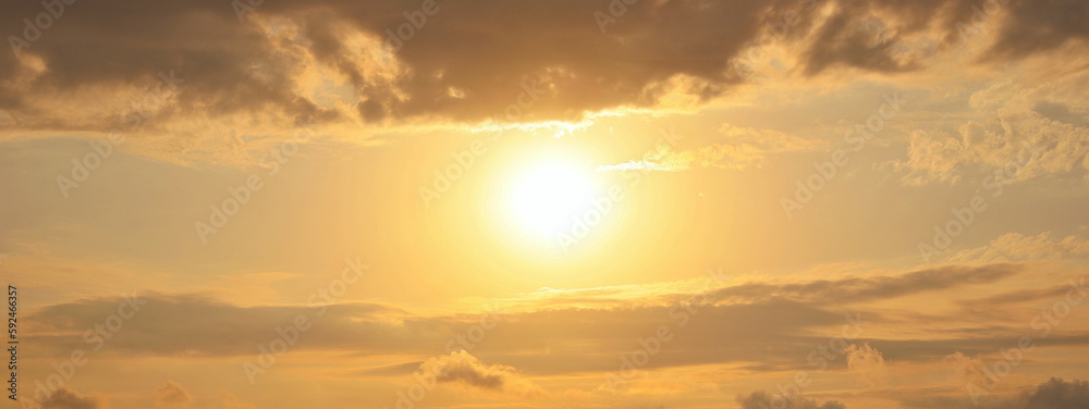 Sun shining on beautiful cloudy sky at sunset, banner design