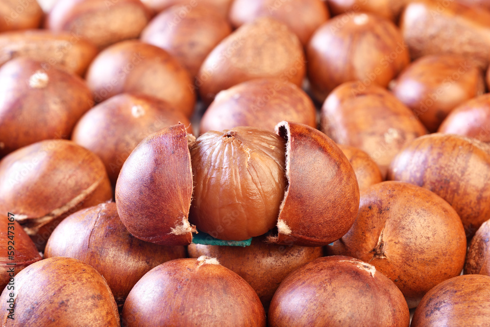 Closeup of chestnuts in a market stall. Shallow depth of field Closeup of chestnuts in a market stall. Shallow depth of field