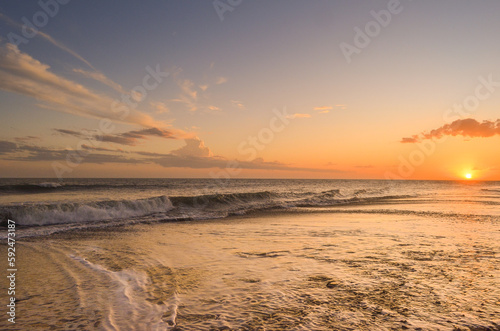 sunset on the beach © Flor