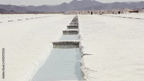 Salt Mining, Salt Extraction at Salinas Grandes Salt Flats in Salta Province, Argentina, South America. 4K Resolution. photo