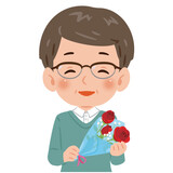 赤いバラの花束を持った中年男性