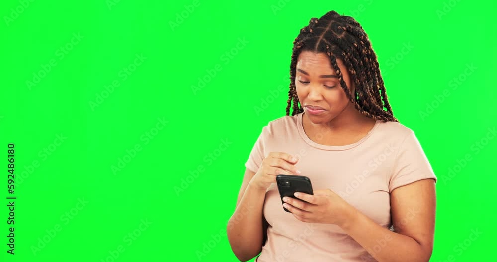 Phone, omg and mockup with a black woman on a green screen background in studio for communication. Mobile, contact and gossip with a female feeling surprised while typing a text message on chromakey Phone, omg and mockup with a black woman on a green screen background in studio for communication. Mobile, contact and gossip with a female feeling surprised while typing a text message on chromakey