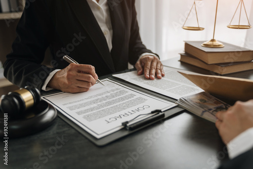 Government tax officials, legal advisers taking bribes of citizens wrapped in brown envelopes. Opening the annual tax evasion, the concept of bribing tax evader officials.