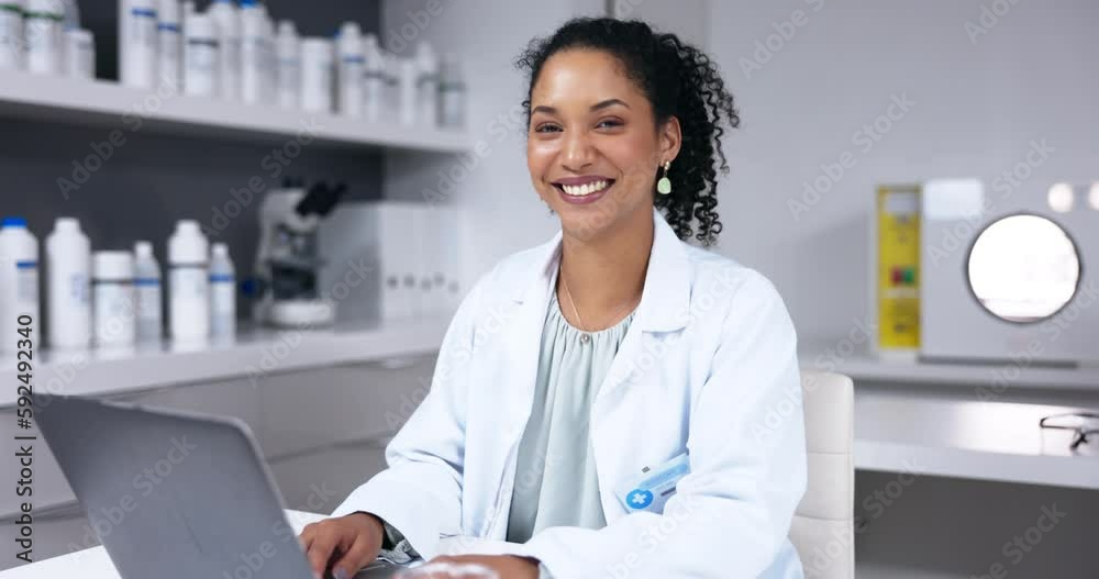 Smile, laptop and face of scientist typing in laboratory for online research or healthcare. Portrait, computer and happy woman, doctor or medical professional with pc for testing, science or analysis Smile, laptop and face of scientist typing in laboratory for online research or healthcare. Portrait, computer and happy woman, doctor or medical professional with pc for testing, science or analysis