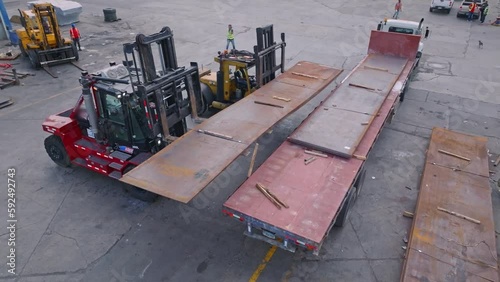 Aerial view of Freight Elevator loading steel on industrial truck at port of Haina,Dominican Republic  photo