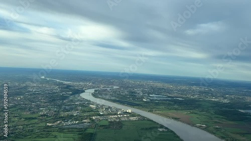 Aerial view of Bordeaux city over the Garionne river, France, from a jet’s cockpit. Pilot’s perspective. 1500m high photo