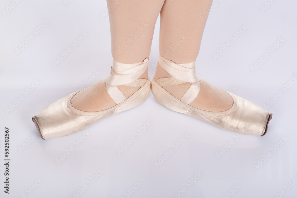 En Pointe CORRECT First position open from above dancers perspective Close up of young female ballet dancer showing various classic ballet feet positions pointe shoes