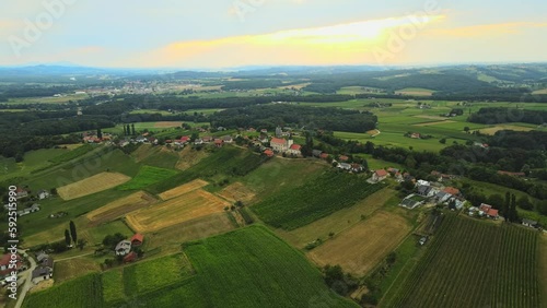 Aerial drone 4K footage of village Hum in Prlekija during sunset. Prlekija is a picturesque region in northeastern Slovenia known for its rolling hills, lush vineyards, and rich cultural heritage. photo