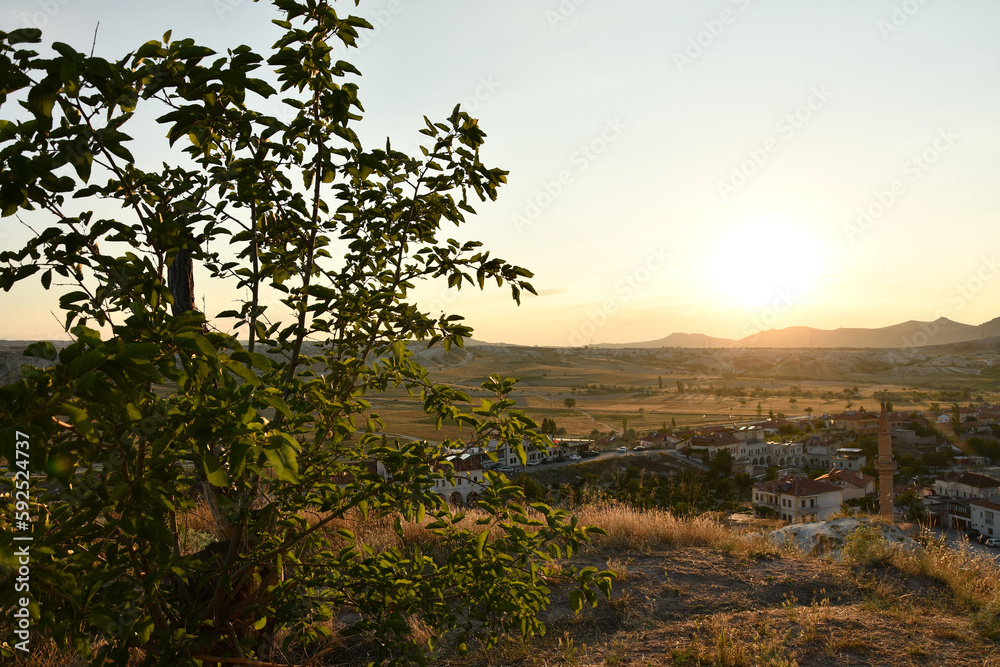 View of the village Cavusin in Cappadocia, Turkey on sunset