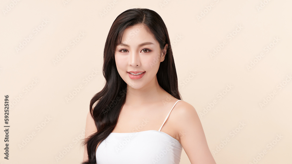 Beautiful young asian woman with clean fresh skin on beige background, Face care, Facial treatment, Cosmetology, beauty and spa, Asian women portrait. Beautiful young asian woman with clean fresh skin on beige background, Face care, Facial treatment, Cosmetology, beauty and spa, Asian women portrait.