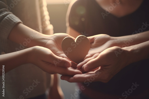 person holding heart Hands holding heart shape paper family cutout, foster care, homeless support, world mental health day, Autism support,  Generative AI	
