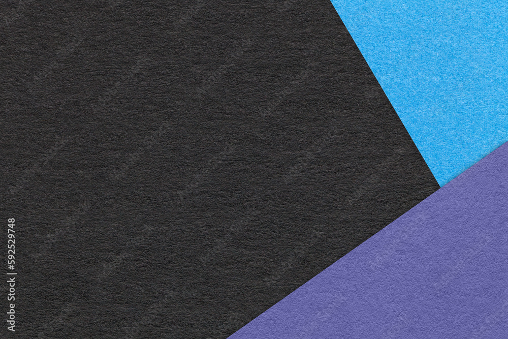 Texture of craft black color paper background with blue and violet border. Vintage abstract cardboard. Texture of craft black color paper background with blue and violet border. Vintage abstract cardboard.