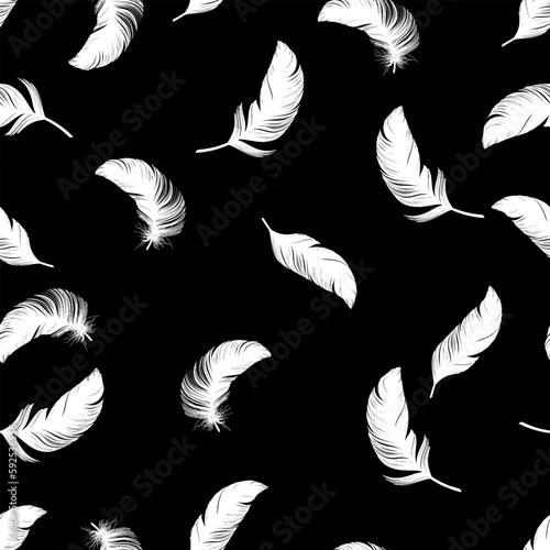 Vector white feathers seamless pattern on black background suitable for fabric and fashion 