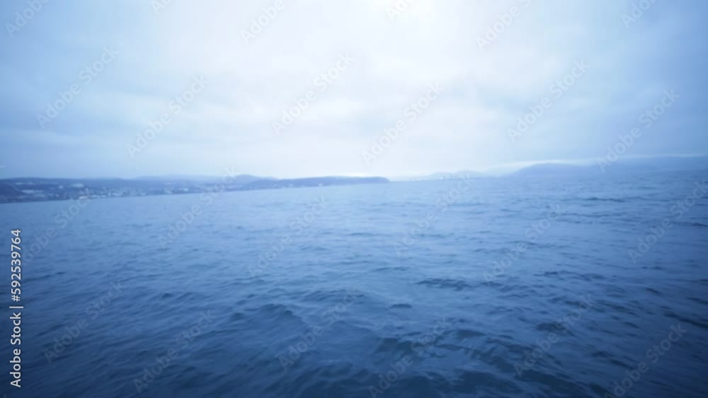 Taking a look around in the middle of the ocean during a cloudy day Taking a look around in the middle of the ocean during a cloudy day