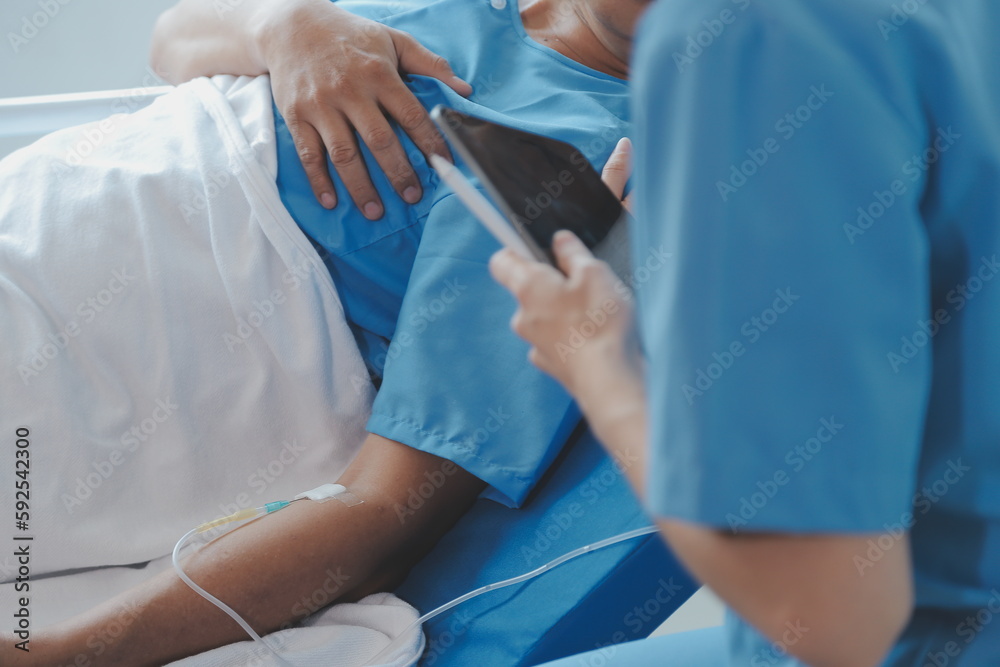 Injured patient showing doctor broken wrist and arm with bandage in hospital office or emergency room. Sprain, stress fracture or repetitive strain injury in hand. Nurse helping customer. First aid. Injured patient showing doctor broken wrist and arm with bandage in hospital office or emergency room. Sprain, stress fracture or repetitive strain injury in hand. Nurse helping customer. First aid.